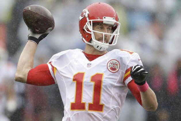 Kansas City Chiefs quarterback Alex Smith (11) passes against the Oakland Raiders during the first half of an NFL football game in Oakland, Calif., Sunday, Oct. 16, 2016. (AP Photo/Ben Margot)