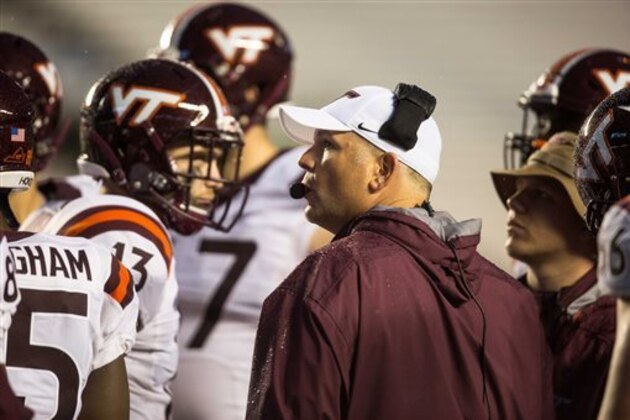 Virginia Tech head coach Justin Fuente speaks to his team during an NCAA college football game against North Carolina in Chapel Hill, N.C., Saturday, Oct. 8, 2016. (AP Photo/Ben McKeown)
