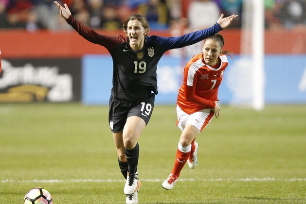 SANDY, UT - OCTOBER 19:  Eseosa Aigbogun #19 of the United States looks for a call from the official as Martina Moser #7 of Switzerland pursues during an international friendly match at Rio Tinto Stadium on October 19, 2016 in Sandy, Utah. (Photo by George Frey/Getty Images)