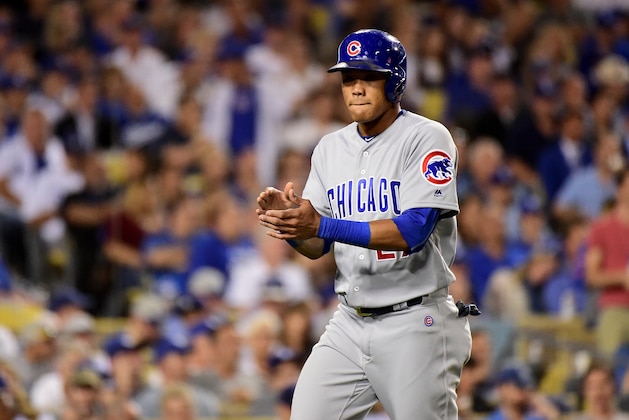 LOS ANGELES, CA - OCTOBER 19:  Addison Russell #27 of the Chicago Cubs celebrates after he scores a run in the sixth inning on a single by Dexter Fowler #24 against the Los Angeles Dodgers in game four of the National League Championship Series at Dodger Stadium on October 19, 2016 in Los Angeles, California.  (Photo by Harry How/Getty Images)