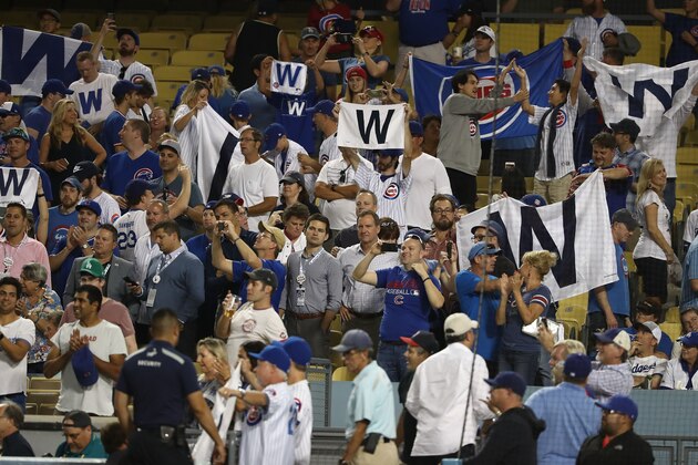 LOS ANGELES, CA - OCTOBER 19:  Chicago Cubs fans celebrate after the Cubs defeated the Los Angeles Dodgers in game four of the National League Championship Series at Dodger Stadium on October 19, 2016 in Los Angeles, California.  (Photo by Sean M. Haffey/Getty Images)