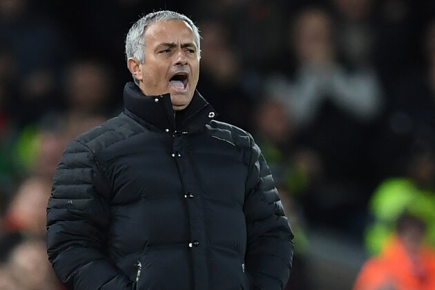 Manchester United's Portuguese manager Jose Mourinho gestures during the English Premier League football match between Liverpool and Manchester United at Anfield in Liverpool, north west England on October 17, 2016. / AFP / Paul ELLIS / RESTRICTED TO EDITORIAL USE. No use with unauthorized audio, video, data, fixture lists, club/league logos or 'live' services. Online in-match use limited to 75 images, no video emulation. No use in betting, games or single club/league/player publications.  /         (Photo credit should read PAUL ELLIS/AFP/Getty Images)
