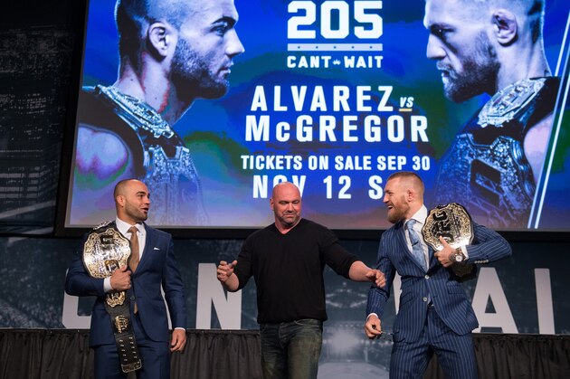 NEW YORK, NY - SEPTEMBER 27:  (R-L) UFC featherweight champion Conor McGregor and UFC lightweight champion Eddie Alvarez face-off during the UFC 205 press event at Madison Square Garden on September 27, 2016 in New York City. (Photo by Brandon Magnus/Zuffa LLC/Zuffa LLC via Getty Images)