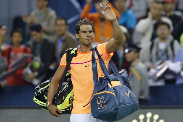 SHANGHAI, CHINA - OCTOBER 12:  Rafael Nadal of Spain leaves the court after lost Viktor Troicki of Serbia during the Men's singles second round match on day four of Shanghai Rolex Masters at Qi Zhong Tennis Centre on October 12, 2016 in Shanghai, China.  (Photo by Lintao Zhang/Getty Images)