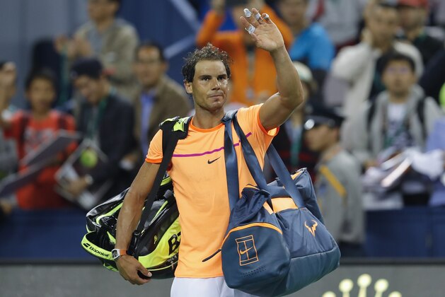 SHANGHAI, CHINA - OCTOBER 12:  Rafael Nadal of Spain leaves the court after lost Viktor Troicki of Serbia during the Men's singles second round match on day four of Shanghai Rolex Masters at Qi Zhong Tennis Centre on October 12, 2016 in Shanghai, China.  (Photo by Lintao Zhang/Getty Images)