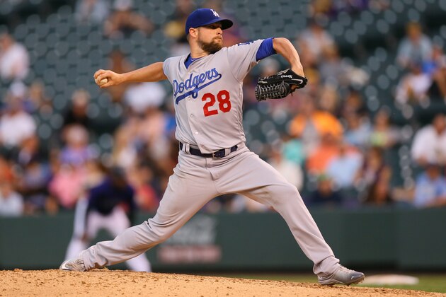 DENVER, CO - AUGUST 31:  Starting pitcher Bud Norris #28 of the Los Angeles Dodgers delivers to home plate during the fourth inning against the Colorado Rockies at Coors Field on August 31, 2016 in Denver, Colorado. The Dodgers defeated the Rockies 10-8 to avoid the series sweep. (Photo by Justin Edmonds/Getty Images)