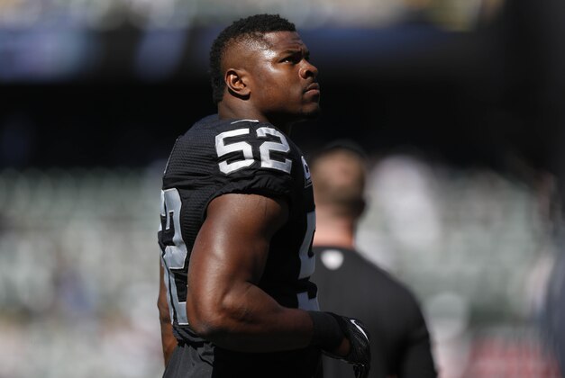 Oct 9, 2016; Oakland, CA, USA; Oakland Raiders defensive end Khalil Mack (52) walks on the field before the start of the game against the San Diego Chargers at Oakland Coliseum. Mandatory Credit: Cary Edmondson-USA TODAY Sports
