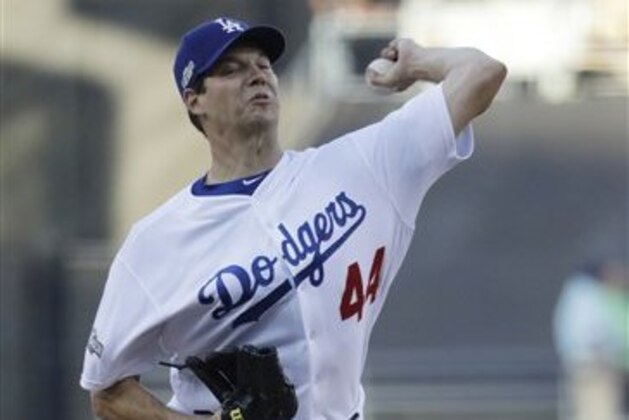 Los Angeles Dodgers starting pitcher Rich Hill throws during the first inning of Game 3 of the National League baseball championship series against the Chicago Cubs Tuesday, Oct. 18, 2016, in Los Angeles. (AP Photo/David J. Phillip)