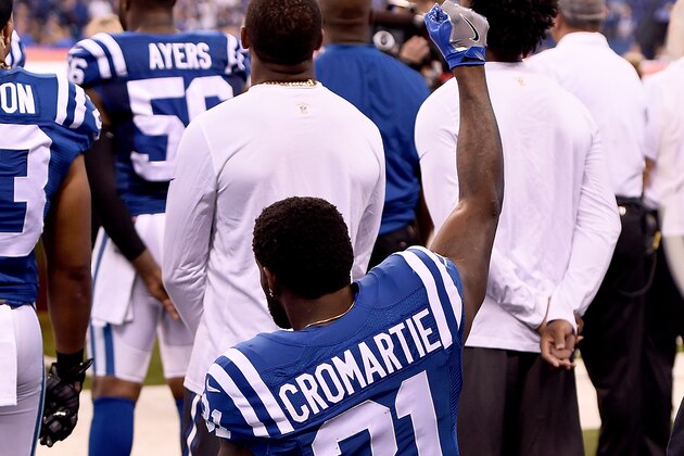 INDIANAPOLIS, IN - SEPTEMBER 25:  Antonio Cromartie #31 of the Indianapolis Colts kneels and raises his fist during the National Anthem before the game against the San Diego Chargers at Lucas Oil Stadium on September 25, 2016 in Indianapolis, Indiana.  (Photo by Stacy Revere/Getty Images)
