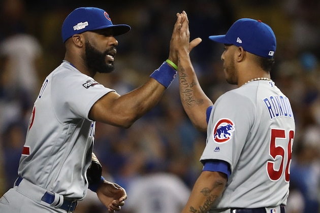 LOS ANGELES, CA - OCTOBER 19:  Jason Heyward #22 and Hector Rondon #56 of the Chicago Cubs celebrate after they defeated the Los Angeles Dodgers in game four of the National League Championship Series at Dodger Stadium on October 19, 2016 in Los Angeles, California.  (Photo by Sean M. Haffey/Getty Images)