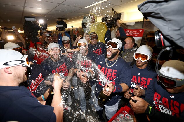 TORONTO, ON - OCTOBER 19:  Carlos Santana #41 of the Cleveland Indians celebrates with his teammates in the locker room after defeating the Toronto Blue Jays with a score of 3 to 0 in game five to win the American League Championship Series at Rogers Centre on October 19, 2016 in Toronto, Canada.  (Photo by Elsa/Getty Images)
