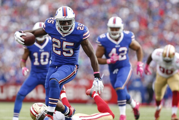 Oct 16, 2016; Orchard Park, NY, USA; Buffalo Bills running back LeSean McCoy (25) runs with the ball and breaks a tackle by San Francisco 49ers free safety Eric Reid (35) during the second half at New Era Field. Buffalo beat San Francisco 45-16. Mandatory Credit: Kevin Hoffman-USA TODAY Sports