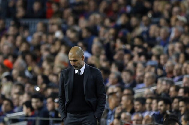 Manchester City's manager Pep Guardiola walks on the sidelines during a Champions League, Group C soccer match between Barcelona and Manchester City, at the Camp Nou stadium in Barcelona, Wednesday, Oct. 19, 2016. (AP Photo/Francisco Seco)