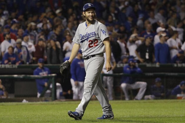 Los Angeles Dodgers starting pitcher Clayton Kershaw (22) reacts as he walks off the mound after the seventh inning of Game 2 of the National League baseball championship series against the Chicago Cubs, Sunday, Oct. 16, 2016, in Chicago. (AP Photo/David J. Phillip)