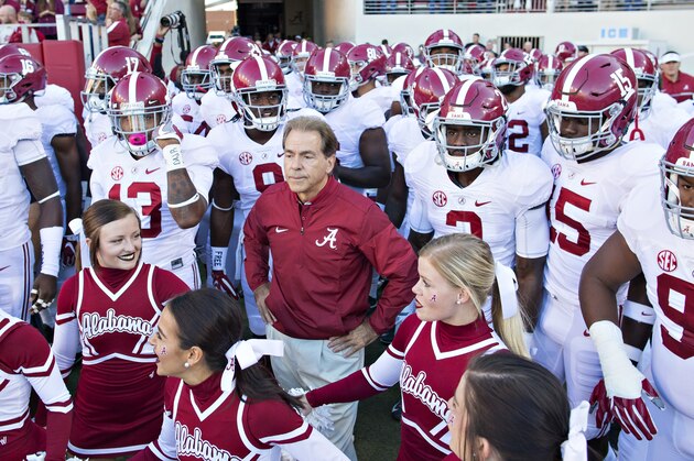 FAYETTEVILLE, AR - OCTOBER 8: Head Coach Nick Saban of the Alabama Crimson Tide waits with team to run onto the field before a game against the Arkansas Razorbacks at Razorback Stadium on October 8, 2016 in Fayetteville, Arkansas. The Crimson Tide defeated the Razorbacks 49-30. (Photo by Wesley Hitt/Getty Images) FAYETTEVILLE, AR - OCTOBER 8: Head Coach Nick Saban of the Alabama Crimson Tide waits with team to run onto the field before a game against the Arkansas Razorbacks at Razorback Stadium on October 8, 2016 in Fayetteville, Arkansas. The Crimson Tide defeated the Razorbacks 49-30. (Photo by Wesley Hitt/Getty Images)