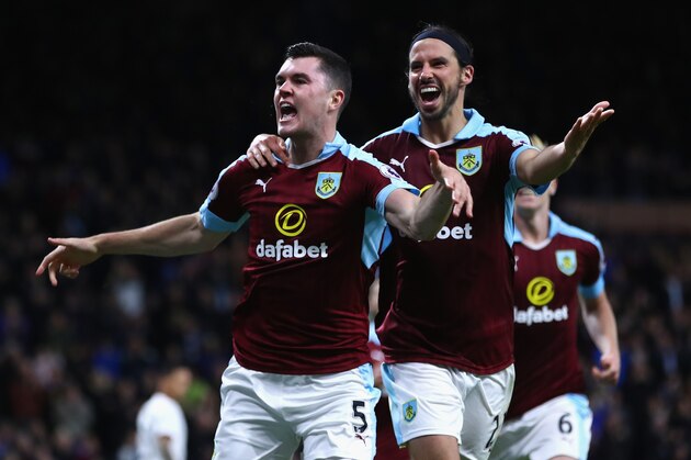 BURNLEY, ENGLAND - SEPTEMBER 26:  Michael Keane of Burnley (L) celebrates scoring his sides second goal with team George Boyd of Burnley (R) during the Premier League match between Burnley and Watford at Turf Moor on September 26, 2016 in Burnley, England.  (Photo by Clive Brunskill/Getty Images)