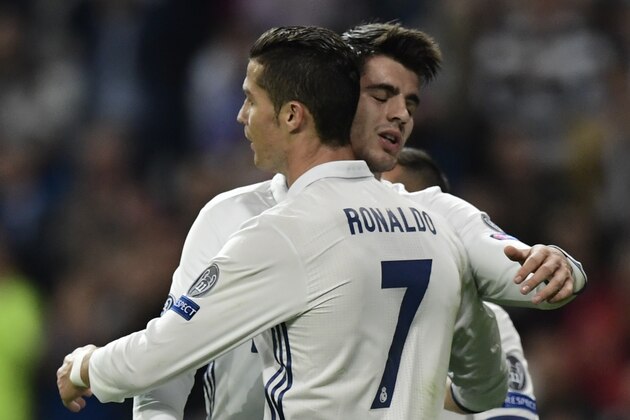Real Madrid's forward Alvaro Morata (R) and Real Madrid's Portuguese forward Cristiano Ronaldo celebrate after scoring a goal during the UEFA Champions League football match Real Madrid CF vs Legia  Legia Warszawa at the Santiago Bernabeu stadium in Madrid on October 18, 2016. / AFP / JAVIER SORIANO        (Photo credit should read JAVIER SORIANO/AFP/Getty Images)