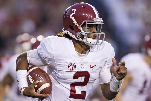 FAYETTEVILLE, AR - OCTOBER 8:  Jalen Hurts #2 of the Alabama Crimson Tide runs the ball during a game against the Arkansas Razorbacks at Razorback Stadium on October 8, 2016 in Fayetteville, Arkansas.  The Crimson Tide defeated the Razorbacks 49-30.  (Photo by Wesley Hitt/Getty Images)