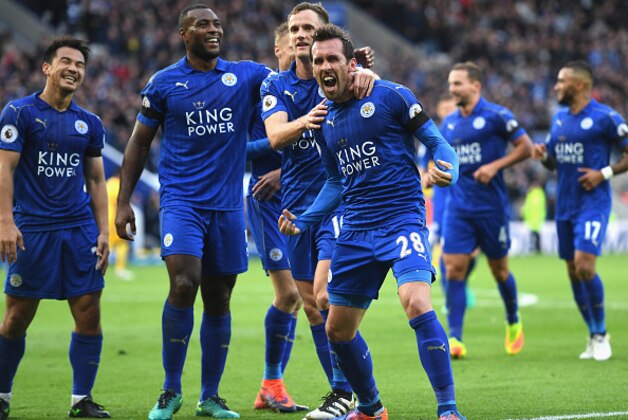 LEICESTER, ENGLAND - OCTOBER 22:  Christian Fuchs of Leicester City (C) celebrates scoring his sides third goal with his Leicester City team mates during the Premier League match between Leicester City and Crystal Palace at The King Power Stadium on October 22, 2016 in Leicester, England.  (Photo by Michael Regan/Getty Images)