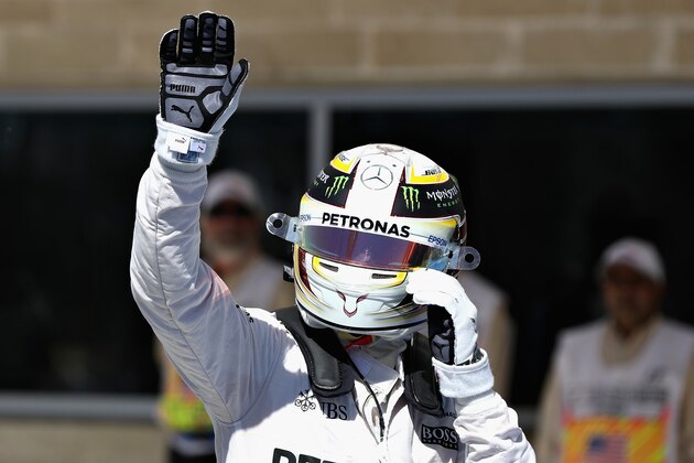 AUSTIN, TX - OCTOBER 22: Lewis Hamilton of Great Britain and Mercedes GP waves to the crowd after qualifying in pole position during qualifying for the United States Formula One Grand Prix at Circuit of The Americas on October 22, 2016 in Austin, United States.  (Photo by Mark Thompson/Getty Images)