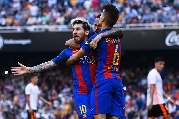 VALENCIA, SPAIN - OCTOBER 22:  Lionel Messi of FC Barcelona celebrates with his team mates Neymar Jr. (C) and Denis Suarez after scoring his team's third from the penalty spot goal during the La Liga match between Valencia CF and FC Barcelona at Mestalla stadium on October 22, 2016 in Valencia, Spain.  (Photo by David Ramos/Getty Images)