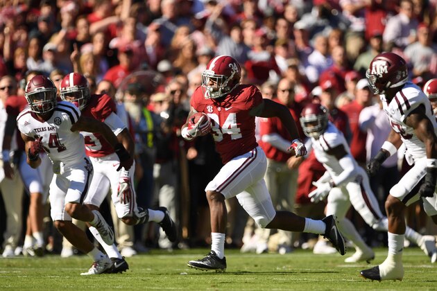Oct 22, 2016; Tuscaloosa, AL, USA; Alabama Crimson Tide running back Damien Harris (34) carries up the field against the Texas A&M Aggies during the first quarter at Bryant-Denny Stadium. Mandatory Credit: John David Mercer-USA TODAY Sports