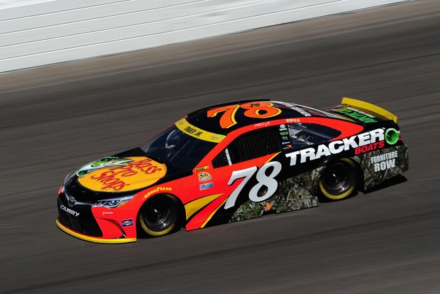 KANSAS CITY, KS - OCTOBER 16:  Martin Truex Jr. drives the #78 Bass Pro Shops/TRACKER Boats Toyota during the NASCAR Sprint Cup Series Hollywood Casino 400 at Kansas Speedway on October 16, 2016 in Kansas City, Kansas.  (Photo by Jeff Curry/Getty Images)