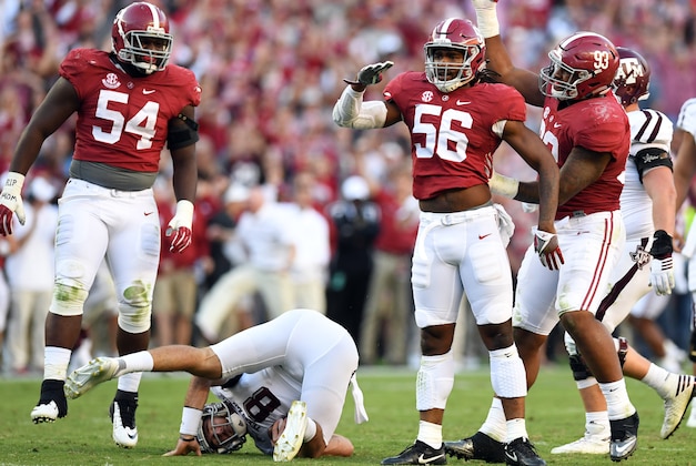 Oct 22, 2016; Tuscaloosa, AL, USA; Alabama Crimson Tide linebacker Tim Williams (56) celebrates his sack with  defensive lineman Jonathan Allen (93) on Texas A&M Aggies quarterback Trevor Knight (8) during the third quarter at Bryant-Denny Stadium. Mandatory Credit: John David Mercer-USA TODAY Sports