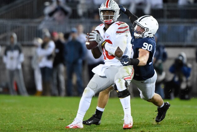 Oct 22, 2016; University Park, PA, USA; Penn State Nittany Lions defensive end Garrett Sickels (90) sacks Ohio State Buckeyes quarterback J.T. Barrett (16) during the third quarter at Beaver Stadium. Mandatory Credit: Rich Barnes-USA TODAY Sports