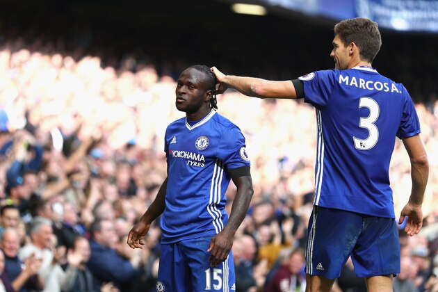 LONDON, ENGLAND - OCTOBER 15: Victor Moses of Chelsea (L) celebrates scoring his sides third goal with Marcos Alonso of Chelsea (R) during the Premier League match between Chelsea and Leicester City at Stamford Bridge on October 15, 2016 in London, England.  (Photo by Ian Walton/Getty Images)