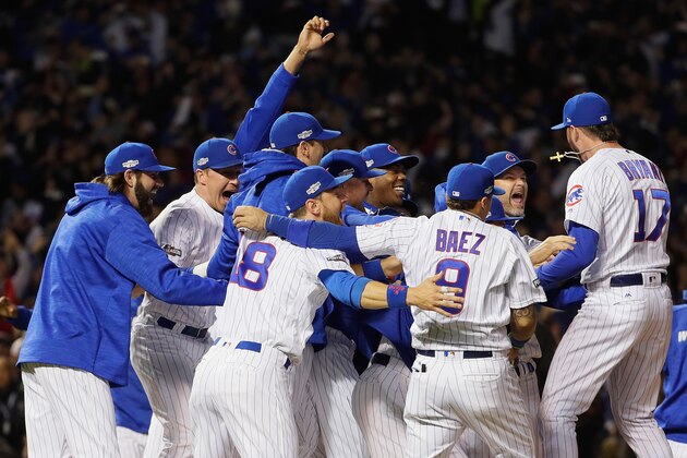 CHICAGO, IL - OCTOBER 22:  The Chicago Cubs celebrate defeating the Los Angeles Dodgers 5-0 in game six of the National League Championship Series to advance to the World Series against the Cleveland Indians at Wrigley Field on October 22, 2016 in Chicago, Illinois.  (Photo by Jamie Squire/Getty Images)