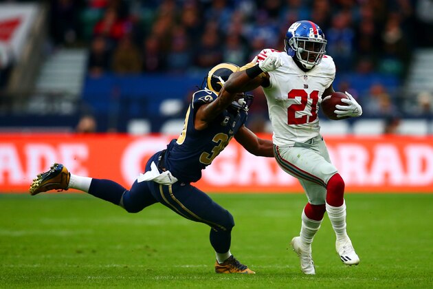 LONDON, ENGLAND - OCTOBER 23:    Todd Gurley #30 of the Los Angeles Rams tackles  Landon Collins #21 of the New York Giants during the NFL International series game between Los Angeles Rams and New York Giants at Twickenham Stadium on October 23, 2016 in London, England.  (Photo by Dan Istitene/Getty Images)