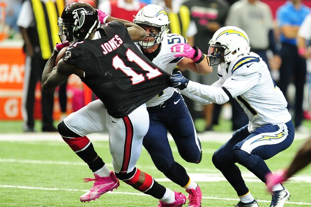 ATLANTA, GA - OCTOBER 23: Julio Jones #11 of the Atlanta Falcons runs with a catch against Steve Williams #41 and Kyle Emanuel #51 of the San Diego Chargers at the Georgia Dome on October 23, 2016 in Atlanta, Georgia. (Photo by Scott Cunningham/Getty Images)