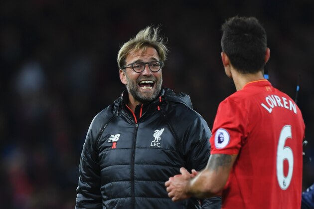 Liverpool's German manager Jurgen Klopp (L) talks with Liverpool's Croatian defender Dejan Lovren (R) after the English Premier League football match between Liverpool and West Bromwich Albion at Anfield in Liverpool, north west England on October 22, 2016. / AFP / PAUL ELLIS / RESTRICTED TO EDITORIAL USE. No use with unauthorized audio, video, data, fixture lists, club/league logos or 'live' services. Online in-match use limited to 75 images, no video emulation. No use in betting, games or single club/league/player publications.  /         (Photo credit should read PAUL ELLIS/AFP/Getty Images)