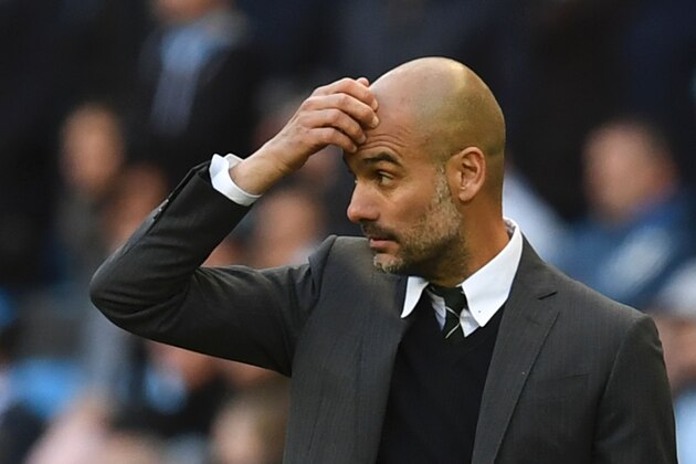 Manchester City's Spanish manager Pep Guardiola gestures on the touchline during the English Premier League football match between Manchester City and Southampton at the Etihad Stadium in Manchester, north west England, on October 23, 2016.
The game finished 1-1. / AFP / Paul ELLIS / RESTRICTED TO EDITORIAL USE. No use with unauthorized audio, video, data, fixture lists, club/league logos or 'live' services. Online in-match use limited to 75 images, no video emulation. No use in betting, games or single club/league/player publications.  /         (Photo credit should read PAUL ELLIS/AFP/Getty Images)
