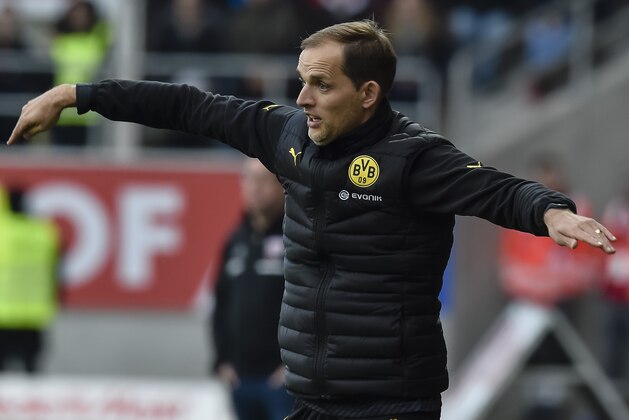 Dortmund's head coach Thomas Tuchel reacts on the sideline during the German first division Bundesliga football match between FC Ingolstadt 04 and Borussia Dortmund in Ingolstadt, southern Germany, on October 22, 2016. / AFP / GUENTER SCHIFFMANN / RESTRICTIONS: DURING MATCH TIME: DFL RULES TO LIMIT THE ONLINE USAGE TO 15 PICTURES PER MATCH AND FORBID IMAGE SEQUENCES TO SIMULATE VIDEO. == RESTRICTED TO EDITORIAL USE == FOR FURTHER QUERIES PLEASE CONTACT DFL DIRECTLY AT + 49 69 650050
        (Photo credit should read GUENTER SCHIFFMANN/AFP/Getty Images)
