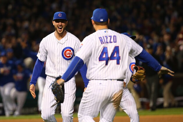 Oct 22, 2016; Chicago, IL, USA; Chicago Cubs first baseman Anthony Rizzo (44) and third baseman Kris Bryant (17) celebrate defeating the Los Angeles Dodgers in game six of the 2016 NLCS playoff baseball series at Wrigley Field. Cubs win 5-0 to advance to the World Series. Mandatory Credit: Jerry Lai-USA TODAY Sports