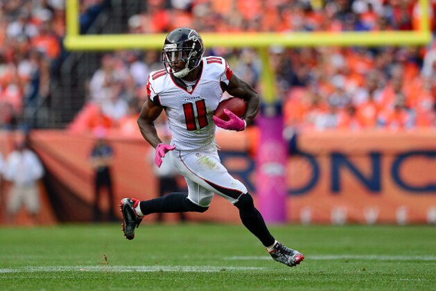 DENVER, CO - OCTOBER 9:  Wide receiver Julio Jones #11 of the Atlanta Falcons runs for extra yards after a catch against the Denver Broncos at Sports Authority Field at Mile High on October 9, 2016 in Denver, Colorado. (Photo by Dustin Bradford/Getty Images)