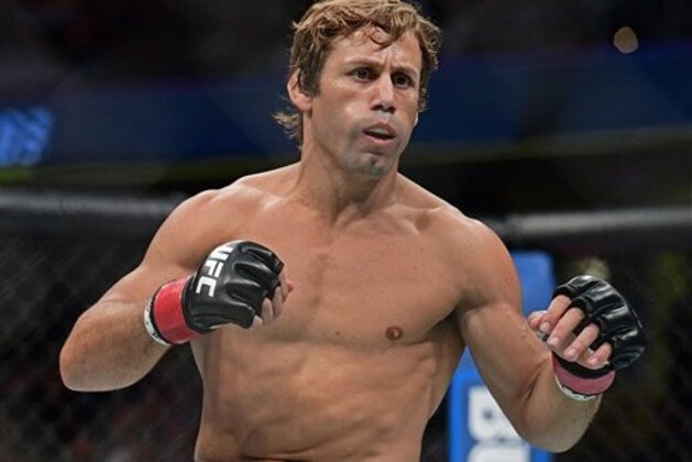Urijah Faber in action against Jimmy Rivera during a bantamweight bout at UFC 203 on Saturday, Sept. 10, 2016, in Cleveland. Jimmy Rivera won via decision. (AP Photo/David Dermer)