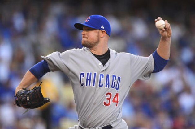 Chicago Cubs starting pitcher Jon Lester throws during the first inning of Game 5 of the National League baseball championship series against the Los Angeles Dodgers Thursday, Oct. 20, 2016, in Los Angeles. (AP Photo/Mark J. Terrill)