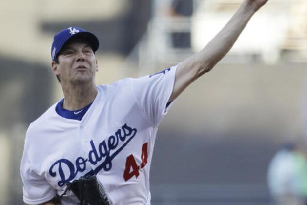 Los Angeles Dodgers starting pitcher Rich Hill throws during the first inning of Game 3 of the National League baseball championship series against the Chicago Cubs Tuesday, Oct. 18, 2016, in Los Angeles. (AP Photo/David J. Phillip)