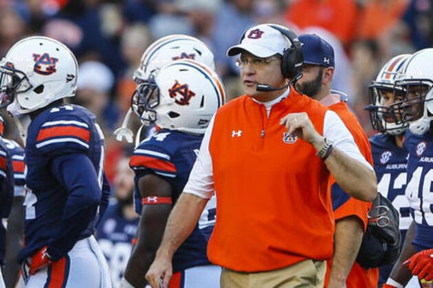 FILE - In this Sept. 24, 2016, file photo, Auburn head coach Gus Malzahn reacts to a targeting call during the first half of an NCAA college football game against LSU, in Auburn, Ala. The 21st-ranked Auburn Tigers have definitely shown signs of improvement in recent weeks, but Saturday's game with No. 17 Arkansas will give a better gauge of where they stand. (AP Photo/Butch Dill, File)