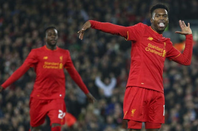 Liverpool's Daniel Sturridge, right, celebrates scoring the second goal of the game during the English League Cup soccer match between Liverpool and Tottenham Hotspur at Anfield in Liverpool, England, Tuesday, Oct. 25, 2016.(AP Photo/Dave Thompson)