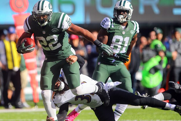 Oct 23, 2016; East Rutherford, NJ, USA; New York Jets running back Matt Forte (22) runs with the ball during the second half at MetLife Stadium. The Jets defeated the Ravens 24-16.  Mandatory Credit: Ed Mulholland-USA TODAY Sports