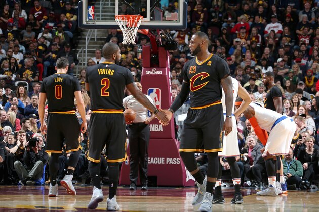 CLEVELAND, OH - OCTOBER 25:  Kyrie Irving #2, and LeBron James #23 of the Cleveland Cavaliers high five during a game against the New York Knicks on October 25, 2016 at Quicken Loans Arena in Cleveland, Ohio.  NOTE TO USER: User expressly acknowledges and agrees that, by downloading and or using this Photograph, user is consenting to the terms and conditions of the Getty Images License Agreement. Mandatory Copyright Notice: Copyright 2016 NBAE (Photo by Nathaniel S. Butler/NBAE via Getty Images)