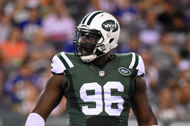 EAST RUTHERFORD, NJ - AUGUST 27:  Muhammad Wilkerson #96 of the New York Jets reacts to a play against the New York Giants during the first quarter at MetLife Stadium on August 27, 2016 in East Rutherford, New Jersey.  The Giants defeated the Jets 21-20.  (Photo by Rich Barnes/Getty Images)