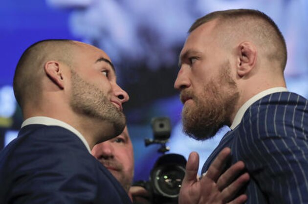 UFC lightweight champion Eddie Alvarez, left, and featherweight champion Connor McGregor, right, pose for photos during a new conference for UFC 205, Tuesday, Sept. 27, 2016, in New York. McGregor and Alvarez will headline the first UFC card to be held in the state since the state legislature legalized the sport earlier this year. UFC 205 is scheduled for Nov. 12. (AP Photo/Julie Jacobson) UFC lightweight champion Eddie Alvarez, left, and featherweight champion Connor McGregor, right, pose for photos during a new conference for UFC 205, Tuesday, Sept. 27, 2016, in New York. McGregor and Alvarez will headline the first UFC card to be held in the state since the state legislature legalized the sport earlier this year. UFC 205 is scheduled for Nov. 12. (AP Photo/Julie Jacobson)