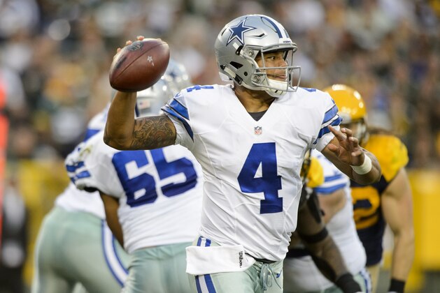 GREEN BAY, WI - OCTOBER 16: Dak Prescott #4 of the Dallas Cowboys passes the ball against the Green Bay Packers during the game on October 16, 2016 at Lambeau Field in Green Bay, Wisconsin. The Cowboys defeated the Packers 30-16. (Photo by Hannah Foslien/Getty Images)