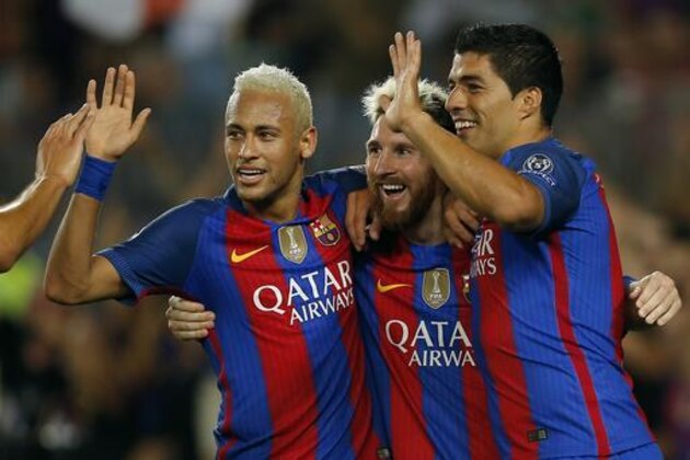 Barcelona's Lionel Messi, center, celebrates with his teammates Luis Suarez, right, and Neymar after scoring his side's fifth goal during a Champions League, Group C soccer match between Barcelona and Celtic, at the Camp Nou stadium in Barcelona, Spain, Tuesday, Sept. 13, 2016. (AP Photo/Manu Fernandez)