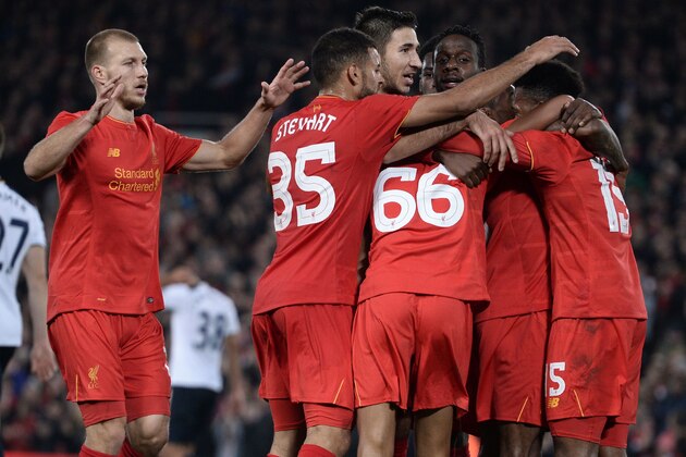 Liverpool's English striker Daniel Sturridge (R) celebrates with teammates after scoring their second goal during the EFL (English Football League) Cup fourth round match between Liverpool and Tottenham Hotspur at Anfield in Liverpool north west England on October 25, 2016. / AFP / Oli SCARFF / RESTRICTED TO EDITORIAL USE. No use with unauthorized audio, video, data, fixture lists, club/league logos or 'live' services. Online in-match use limited to 75 images, no video emulation. No use in betting, games or single club/league/player publications.  /         (Photo credit should read OLI SCARFF/AFP/Getty Images)